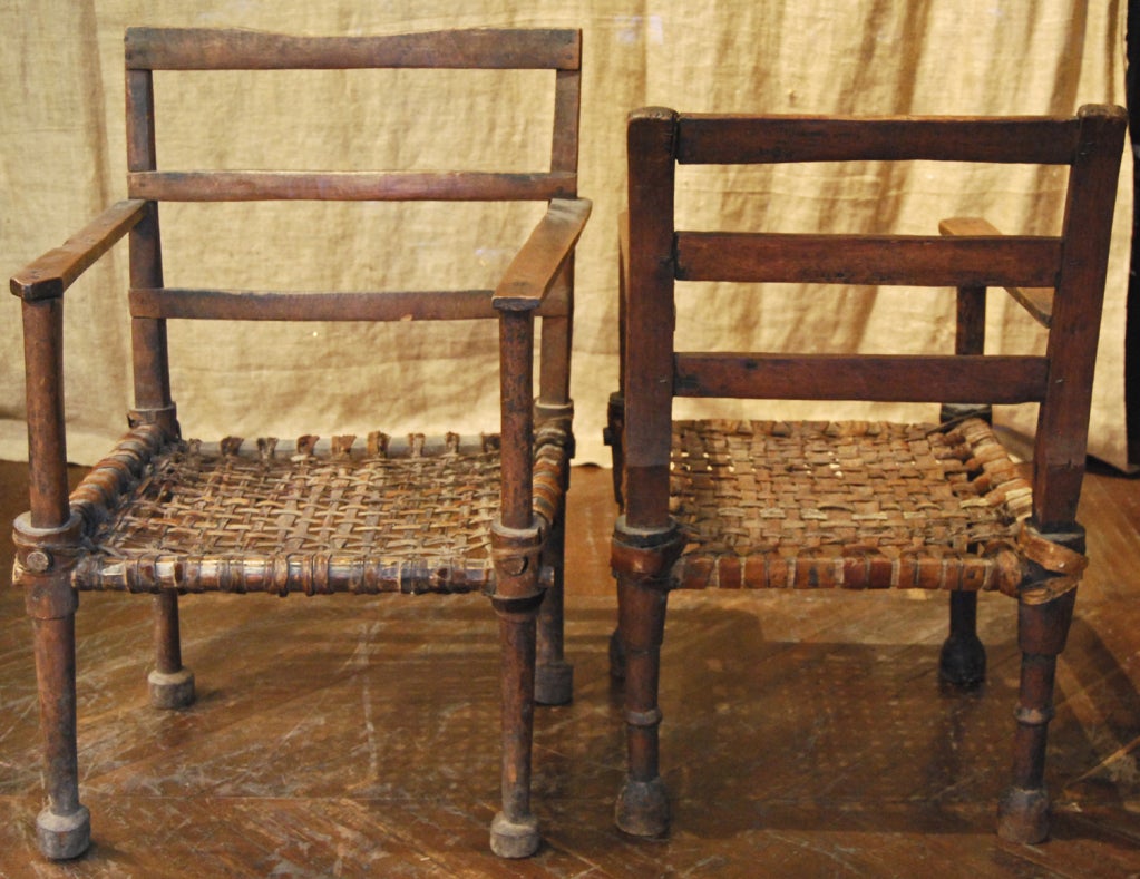 antique chieftain chairs from ethiopia, sold as a pair