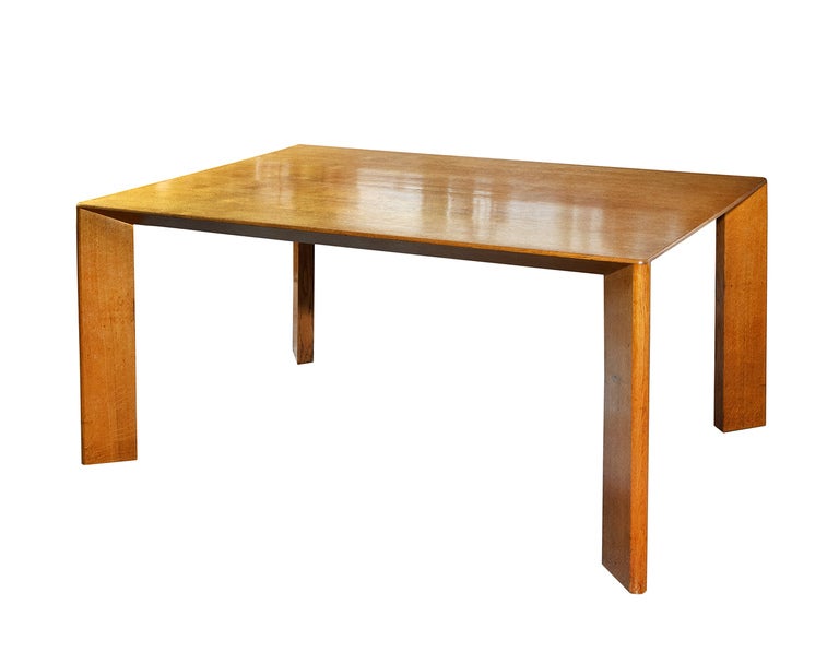 Made of highly figured oak by Maison Pierre Gouffé -- for whom Jean Royère was the head designer from the mid-1930s to the early 1940s -- this elegant little dining table is exquisitely constructed, and in beautifully original condition. The oblique