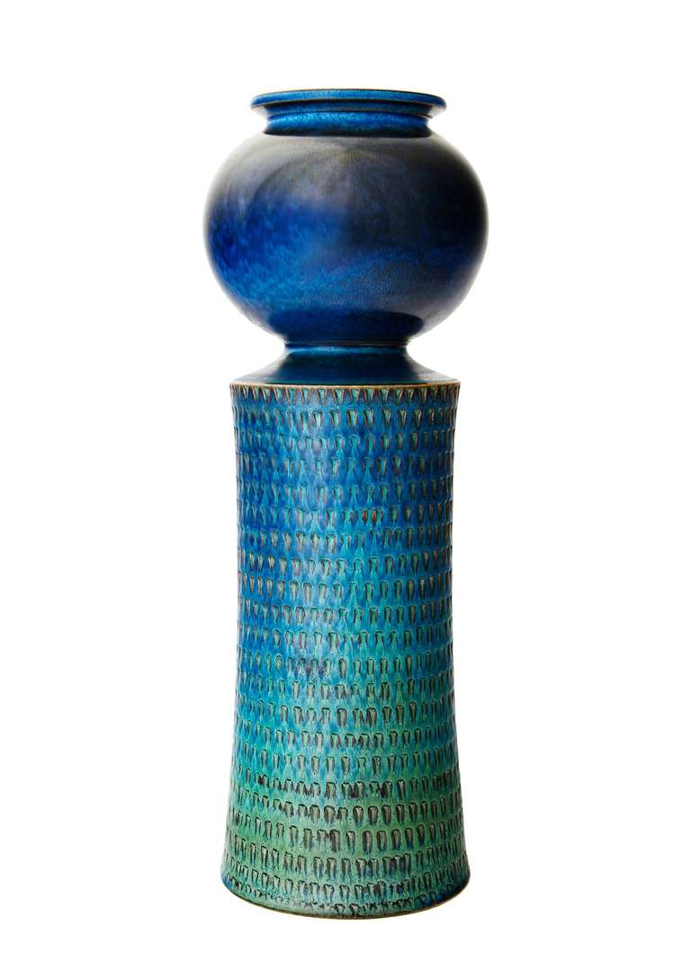 In form, glaze, and size, this unique studio vase, made in 1963, is truly the King of Stig Lindberg vases. The highly desirable turquoise glaze is here rendered with an even greater complexity than is normally seen, revealing a transition from the