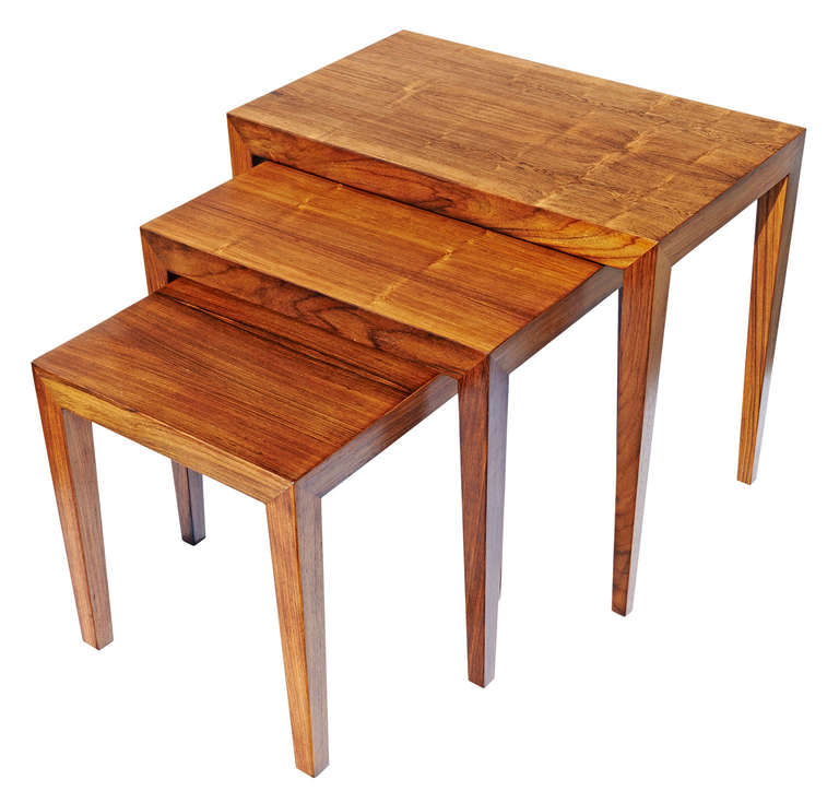 The rosewood used for these three tables is gorgeously figured. Their very crisp condition is also remarkable. Designed in the mid-1960s by Ole Wanscher for Haslev Møbelsnedkeri. 

23 w x 14 d x 19.75 h inches