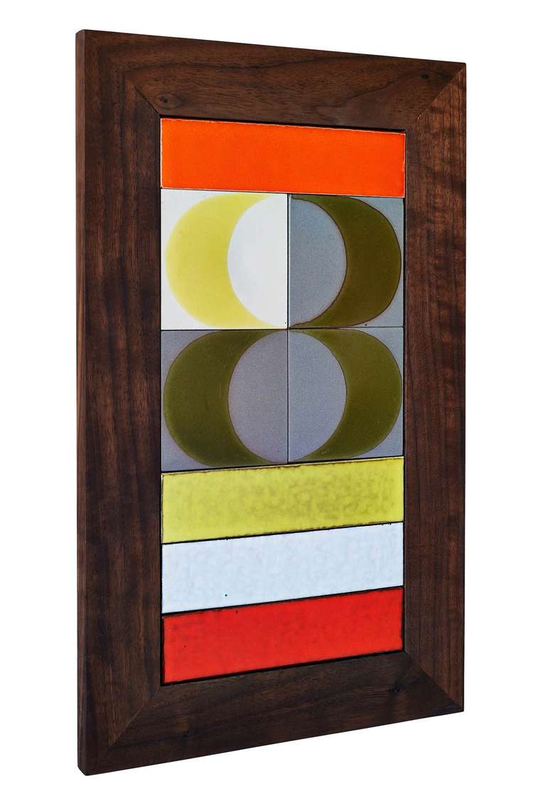 This wall-plaque comprises eight ceramic tiles created by Gilbert Portanier and Roger Capron, two of postwar France's leading ceramists. The frame is solid walnut.