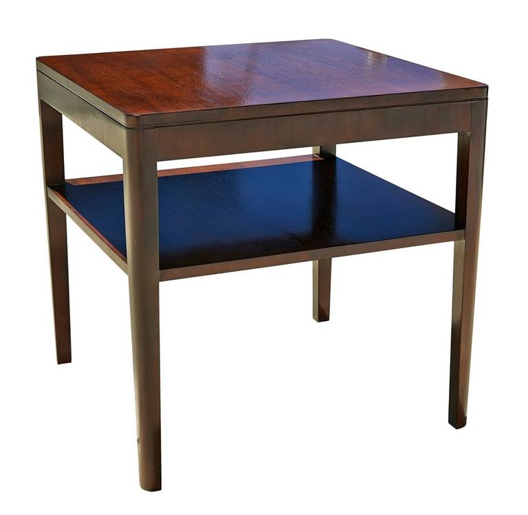 Made in 1942, this two-tier, lacquered walnut end table is handsome and substantial. It was originally owned by Joel Schiller, a Hollywood production designer who was friends with Billy Haines and his partner James Shields, from whom he received it