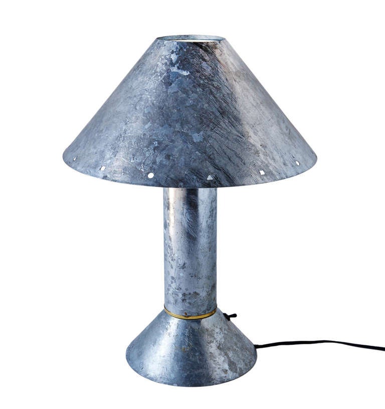 We have three of these wonderful lamps available. A very sophisticated design, that appeared prominently in HEAT, the great 1990's Al Pacino / Robert De Niro film. Designed by Southern California industrial designer and lighting wunderkind Ron
