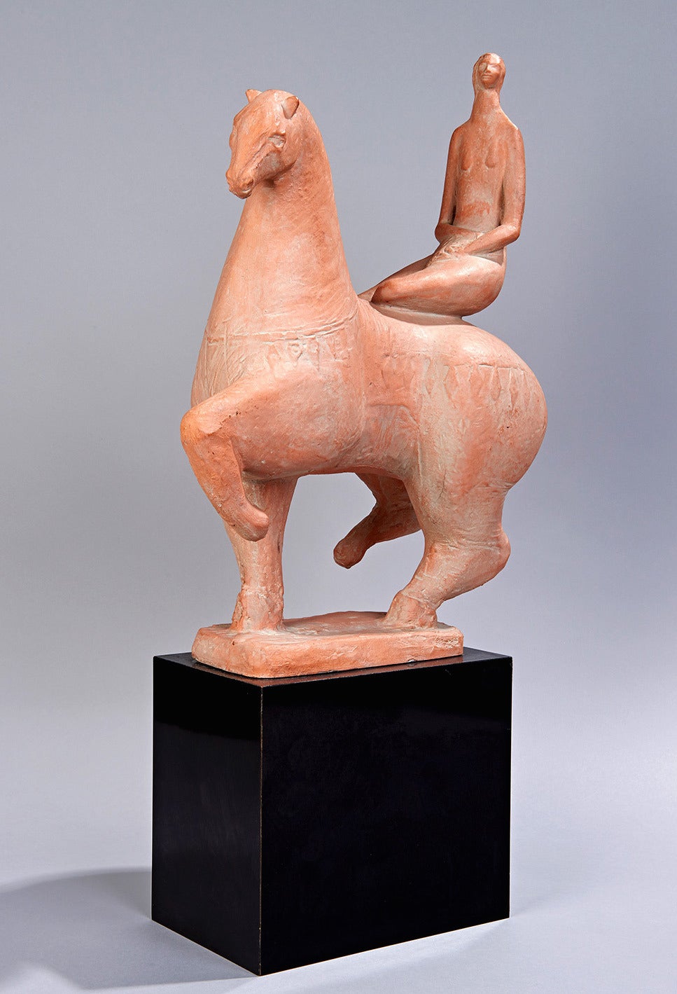 This anonymous sculpture made in the 1960s is a magnificent equestrian monument in miniature. Both the rider and the horse have superbly expressive lines and proportions. The contrast between the relaxed posture and attenuated femininity of the