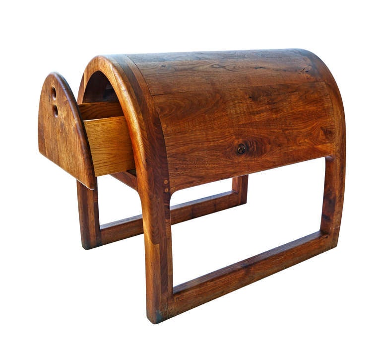 An unusual saddle stand, with two capacious drawers for storing various bits of horse tack. Very sturdily hand-built of solid walnut, in something of the style of the late great Sam Maloof. Most saddle stands are built with little consideration for