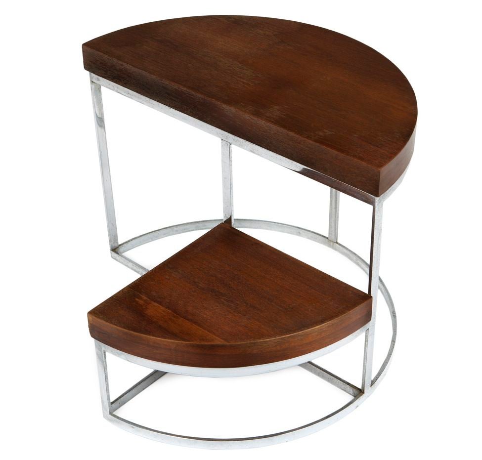 This unusual two-level table is ideal for displaying collected objects. It could also be pressed into service as an elegant kind of library step-stool.