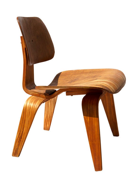 This molded plywood chair was an experimental maquette used at the Eames Office for testing dimensional variations in the DCW chair. The legs and central spine are segmented, and where the production chairs used rubber shockmounts, this one has