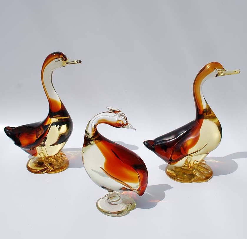 Set of 3 Archimede Seguso birds ($2500, Circa 1950's), Pair of Barbini ducks ($250), Murano sommerso duck ($125).  *Notes: There is no sales tax on this item if it is being shipped out of the state of Florida (Objects In The Loft will need a copy of