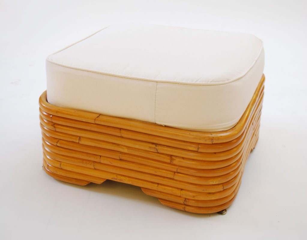 Stacked base rattan ottoman in the manner of Paul Frankl.  We have 2 ottomans available, priced each.  *Notes: There is no sales tax on this item if it is being shipped out of the state of Florida (Objects20c/Objects In The Loft will need a copy of