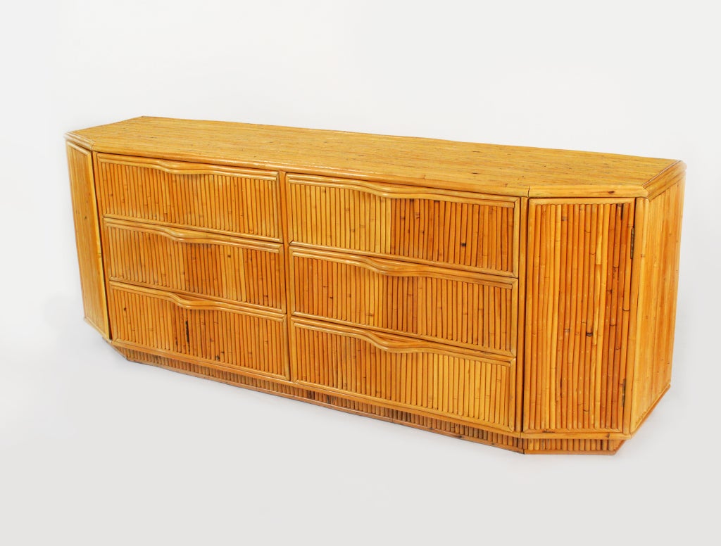 Vintage rattan cabinet/dresser with six drawers and two doors revealing three shelves.<br />
<br />
*Notes: There is no sales tax on this item if it is being shipped out of the state of Florida (Objects In The Loft will need a copy of the shipping