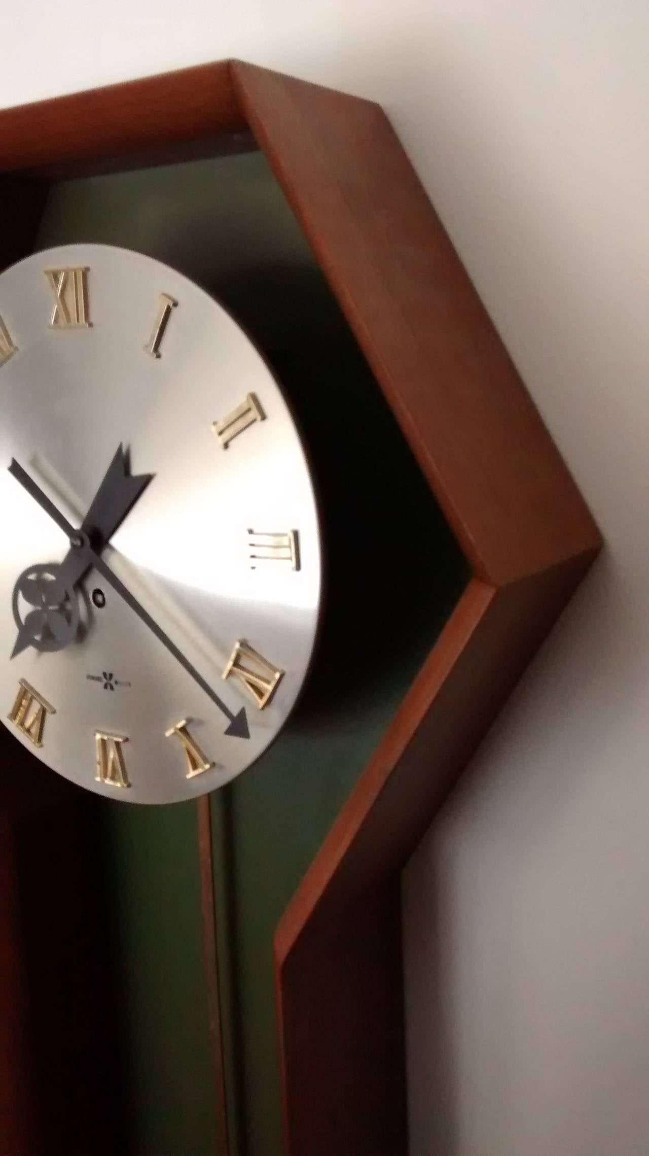 Mid-Century Modern Wall Mounted Pendulum Clock by George Nelson for Howard Miller For Sale