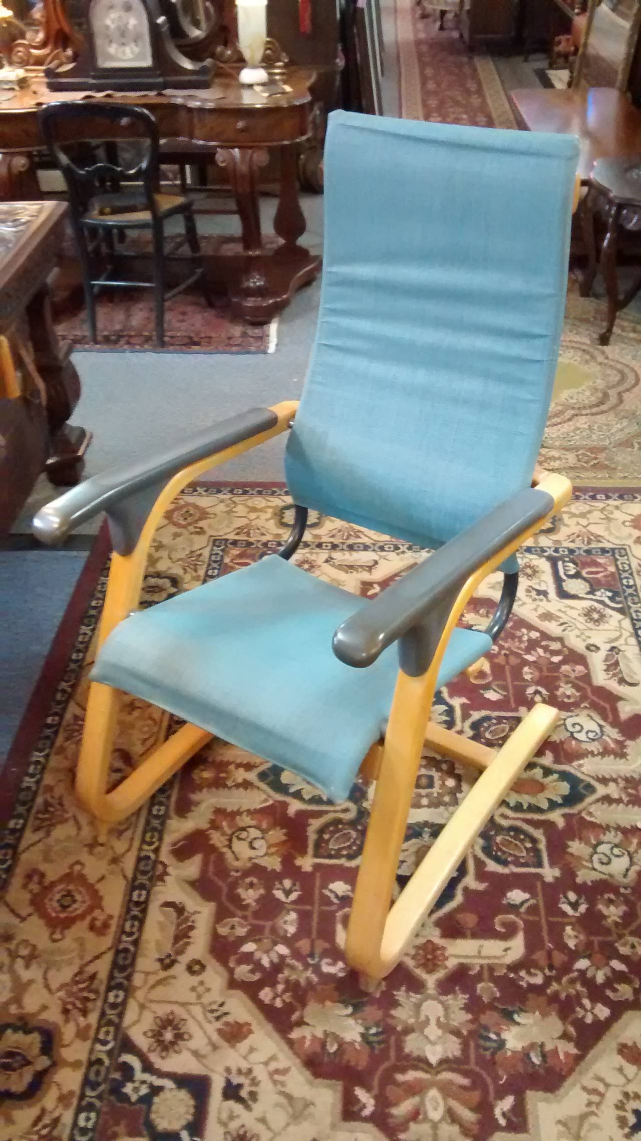 Beautiful and ergonomically designed Thonet armchair attributed to Marcel Breuer, and dating to the late 60's or early 70's. 

Comprised of steam bent and laminated sleds, this chair retains it's original covering, which are basically sleeves of a