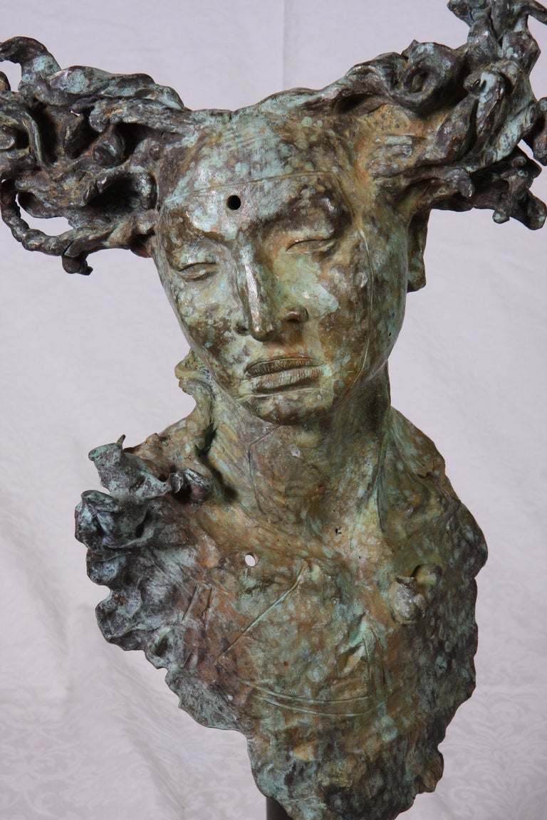 Superb Javier Marin (b. 1962) signed bronze bust on iron stand, dating to 2003.  

Signed on verso: 