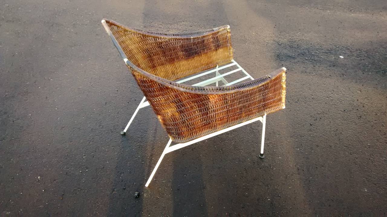 Superb and rarely found pair of lounge chairs by Maurizio Tempestini for Salterini. Imported from Italy, and dating to the late 1950s. 

Rendered in 1/2'' welded iron rod stock, painted white, and strung with thin bamboo stripping. A wonderful,