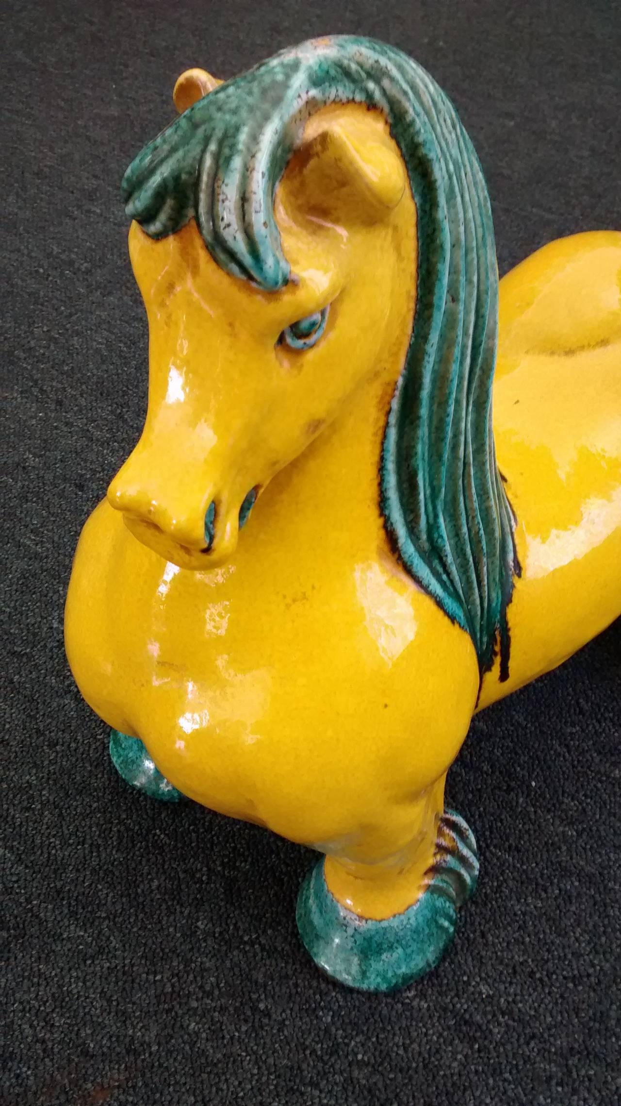 Wonderfully rendered large Italian pottery figure of a horse, possibly by Alvino Bagni. Dates to about 1960. 

Intense lemon yellow and turquoise glazing, wonderful and whimsical form.