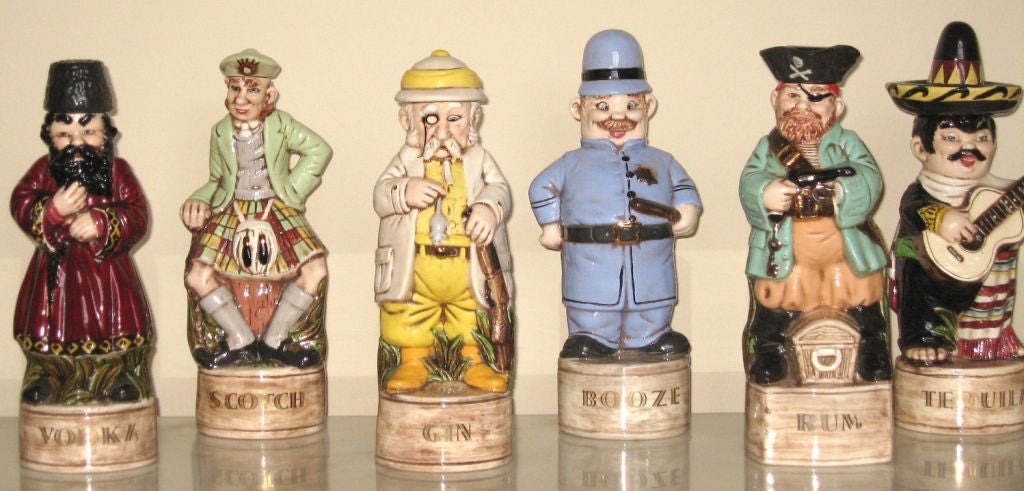 Vintage Set of Eleven Handpainted Liqueur Bottles