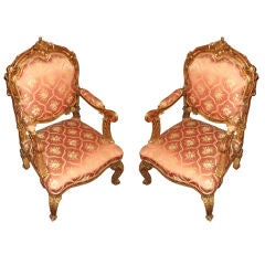 Pair of Carved and Gilded Italian Baroque Style Fauteuils