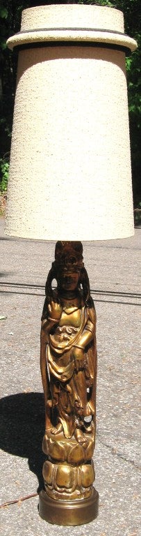 Superb mid century modern Asian form table lamp in the style of James Mont, dating to the mid 1950's. 

Extremely heavy, rendered in cast composition with a metal base, generous size with original shade and wiring intact. 

Gilding is in very
