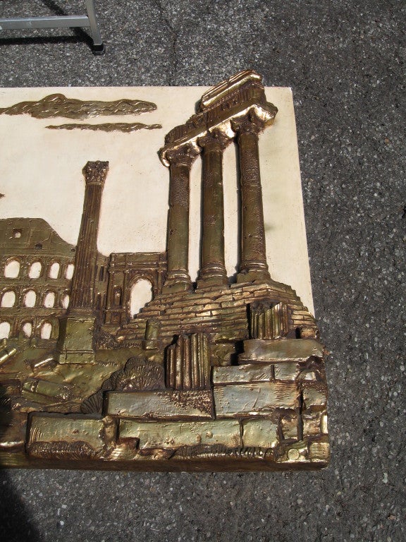 Massive Harold Art Studios of New York bas relief fiberglass scene of the Roman Forum, dating to the late 1950's. Cream glazed background and raised gilded decoration showing the Coliseum and the Forum in the foreground. Harold Art Studios also