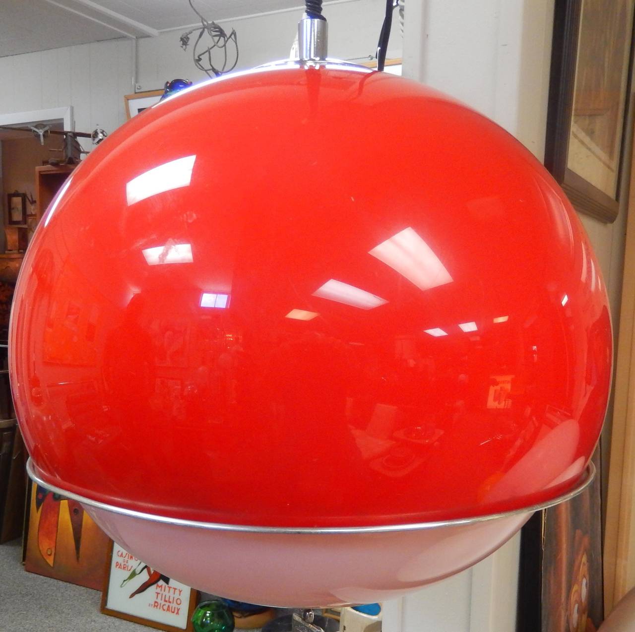 Italian made Giannelli red acrylic sphere light, dating to circa 1970. Rendered in red and white acrylic with aluminum trim and appointments. 

Rare to find one in this color and condition.