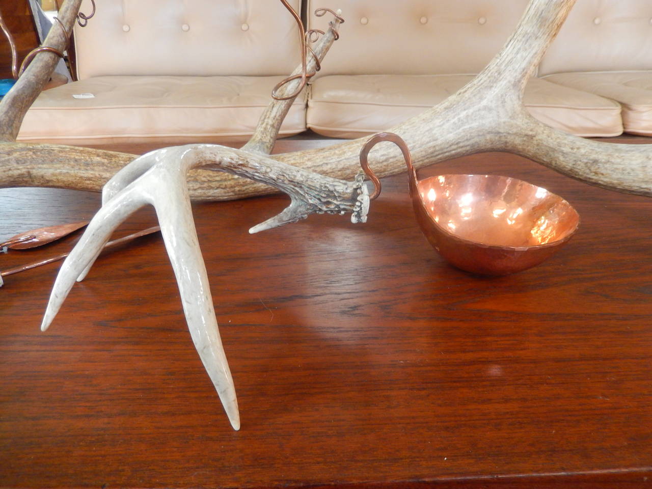 Table centerpiece display candelabra set rendered in horn and copper by designer Ben Caldwell of Nashville, Tennessee. 

This artist made Oprah Winfrey's 