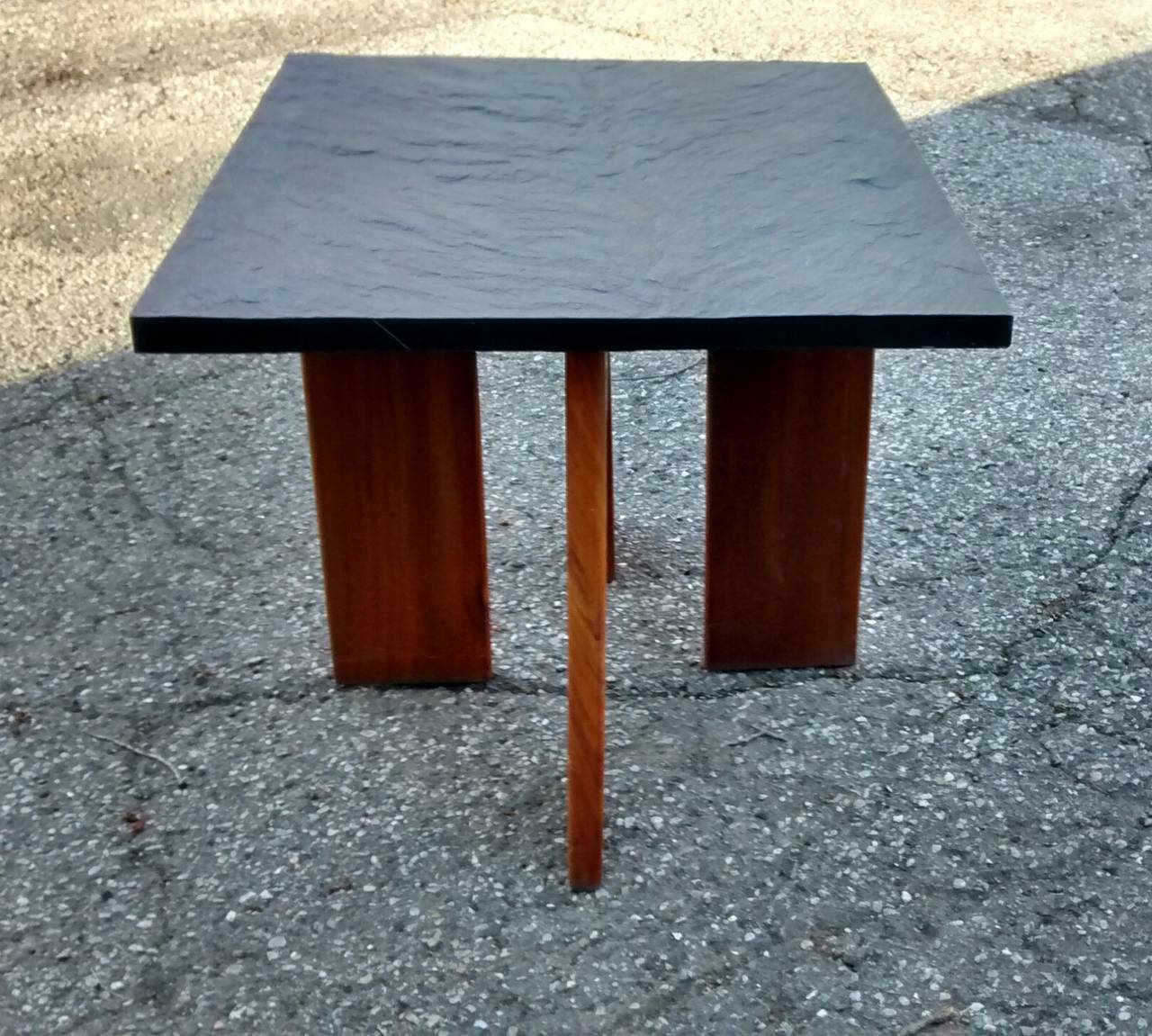 Fantastic recent estate find is this pair of Adrian Pearsall designed end tables for Craft Associates, dating to about 1970. 

Rendered in a flat, oil finished walnut with heavy duty black slate tops, this pair are in remarkable condition, and