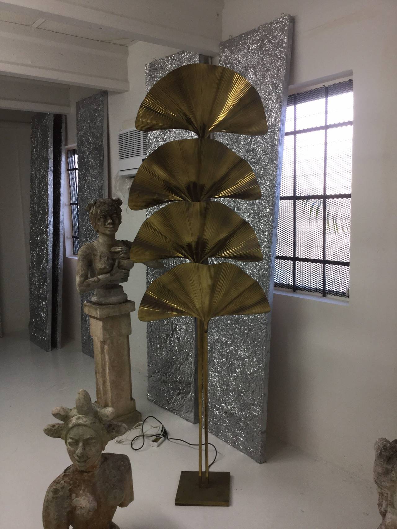 Brass Tommaso Barbi Floor lamp with a great patina
