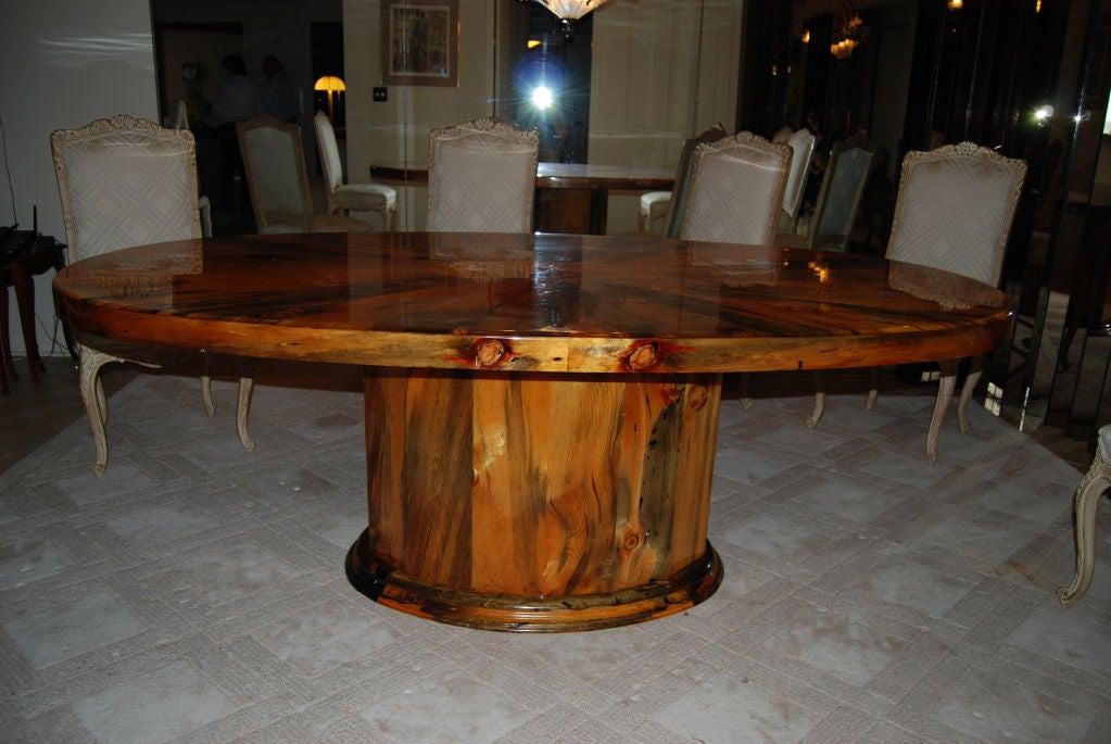 Extraordinary!  Elliptical shaped dining table executed in exotic woods with 2.5