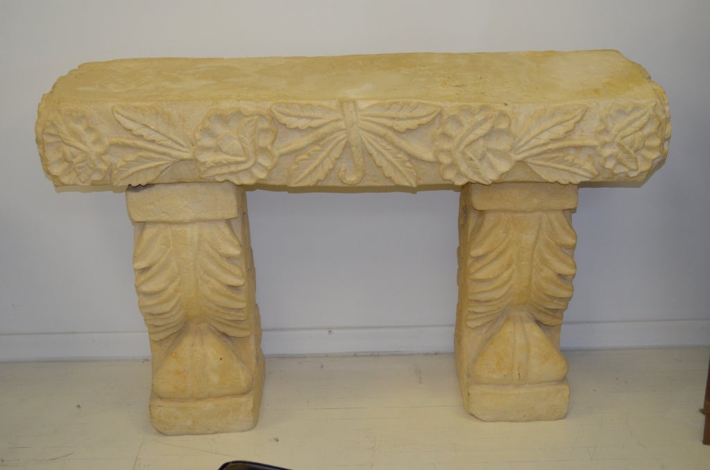 Great artisan console table. Executed in a plaster composition with flower motif. Table finish emulates stone. Perfect for indoors or outdoors.