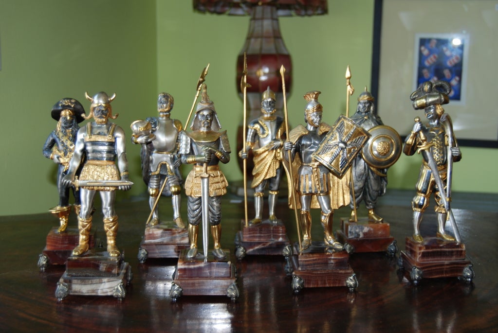 Very fine collection of noted Italian artist, Gippe Vasani armored knights. Sculptures are executed in guilt bronze and silver, and mounted on their original brown marble base. Incredible detail to each. All are signed on back legs and with a bronze