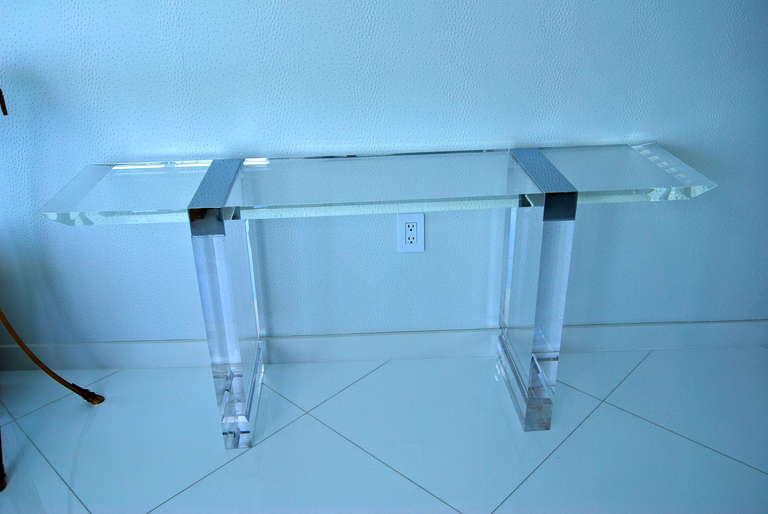 Stunning ! Charles Hollis Jones Attributed console table executed in lucite and polished steel. Console table is designed with  3