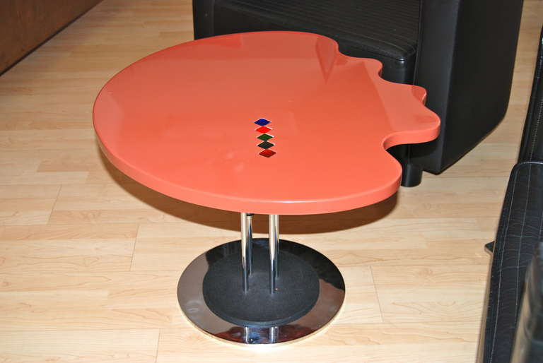 Palette shaped Saporiti occasional table with colored glass gemstone insets to top as shown. Circular base is designed in high polished chrome and black matte metal. Table is perfect between two chairs, side table or small cocktail table. For