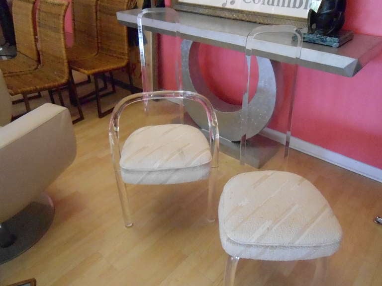 Chic! Set of six Charles Hollis Jones style high back lucite dining chairs with chrome fittings as shown. Set comes with two armchairs and 4 side chairs. Perfect in a room with a view as chairs are clear, crisp and transparent. Chairs retain
