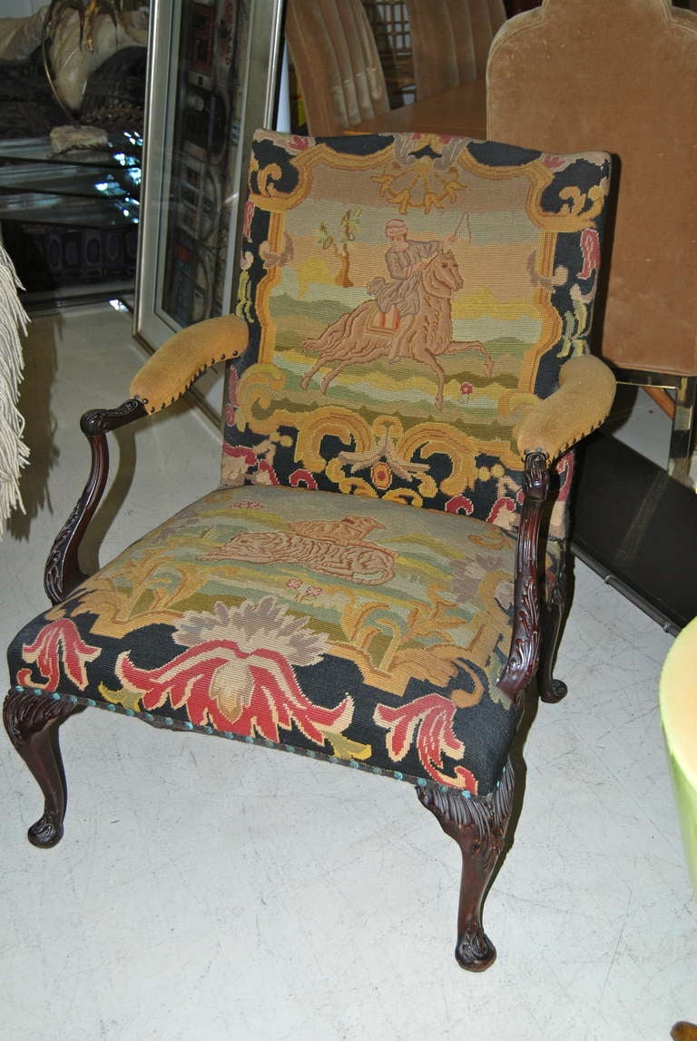 Superb 19th century  library armchair with needlepoint tapestry seat and back. Possibly early 1800's. Nice detail to carving as shown.Beautiful and  graceful.  Extremely comfortable. Perfect in a library,living room or bedroom!
NOTE: FOR BEST NET