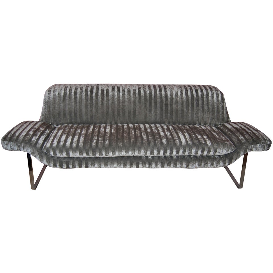 Sleek and Sculptural Sofa With Flat Bar Polished Steel Legs
