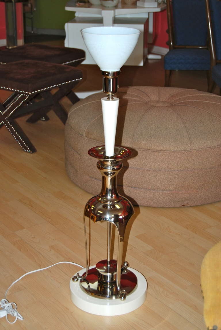 Pair of nickeled table lamps with high gloss lacquered wood accents. Original milk glass insert.