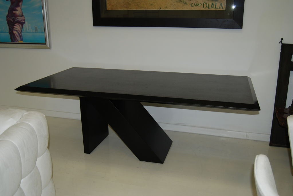 Amazing custom architectural wood and steel dining table in the manner of noted Tony Smith. Angled steel base supports a 3