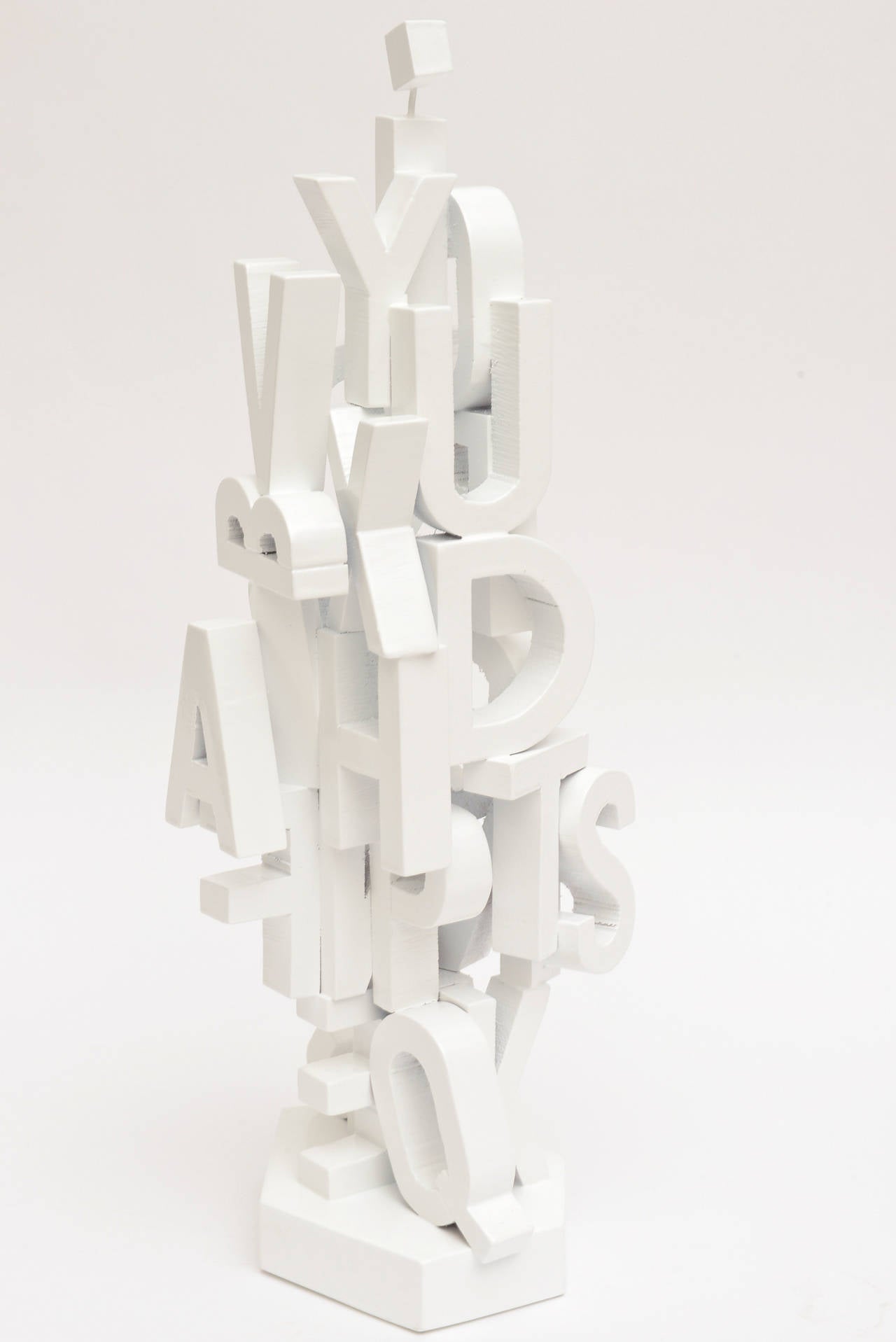 This Mid-Century white lacquered alphabet tree sculpture is vintage.
A great object or sculpture in any room.