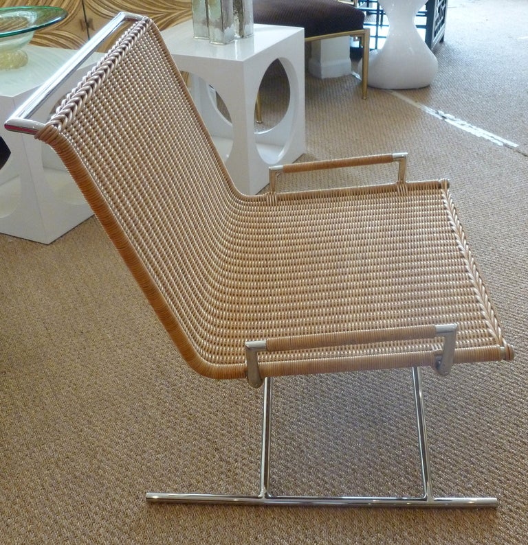 These desirable and collectable wicker and steel heavy sled chairs by Ward Bennett are in immaculate condition.