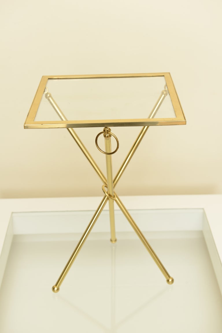 American Four Brass and Glass Chapman Folding Tripod Drink Tables