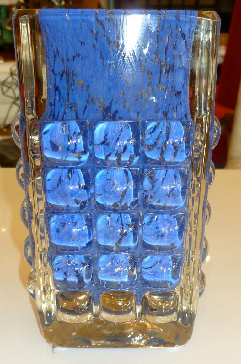 Glass Protruding cubes jut out from this interesting german signed 
vase. The most luscious color of royal splattered blue and clear glass make this vase very painterly. This is unusual, obscure and rare... this makes a wow statement for flowers or