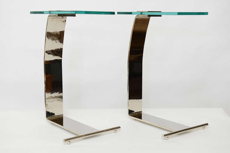 These chic and simple side tables are by Pace.