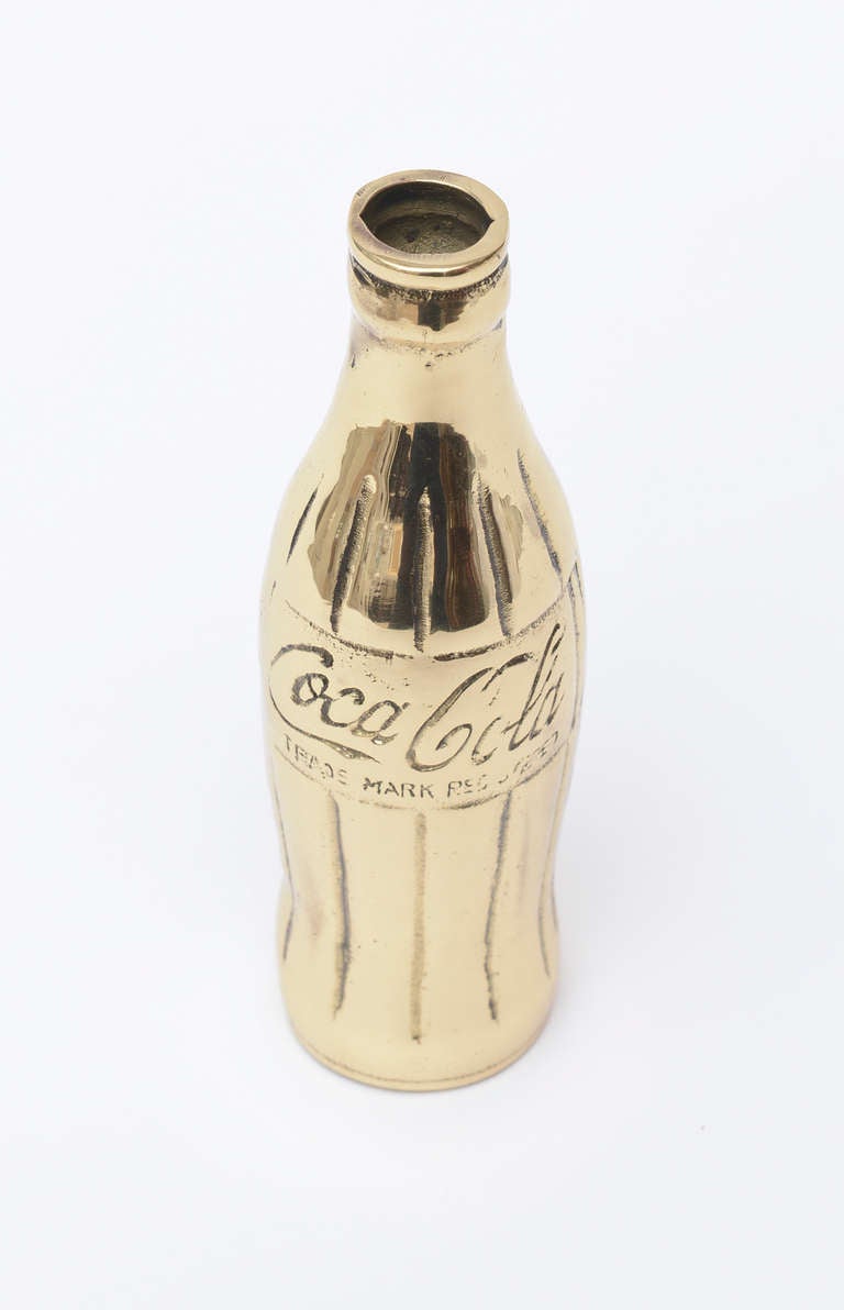 This great pop art Claes Oldenburg/Andy Warhol style and influenced polished coke bottle has an element of iconic fun and tongue in cheek...

A great piece of art and sculpture!!!

NOTE: THIS WILL BE ON THE SATURDAY SALE FOR 1 WEEK ONLY