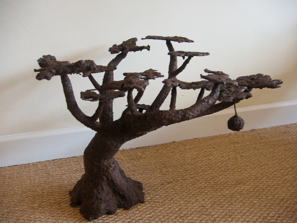 Magnificent standing bonsai tree in its original rusty condition. A free standing work of art--this tree is so chic and elegant. A separate small birds nest hangs from any limb. Heavy and sturdy--it does not topple over. Can stand freely anywhere