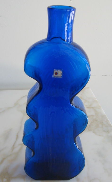This vase Blenko bottle is Yves Klein blue.   It features an organic and curvaceous shape and can be viewed from all angles.Luscious!!!!!!!!