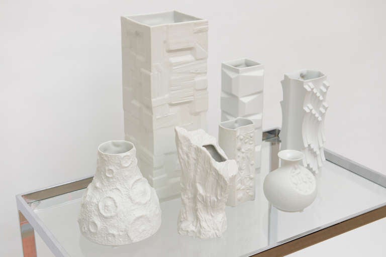 All of these German white pique Porcelain vases make a great still life setting... sold as 7... they are textural and dimensional; given their varying sizes and heights.... these make a great collection.

Please call for all sizes.... 

The