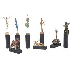 Set of Nine Miniature Dali-Esque Painted Wood and Mixed Media Sculptures