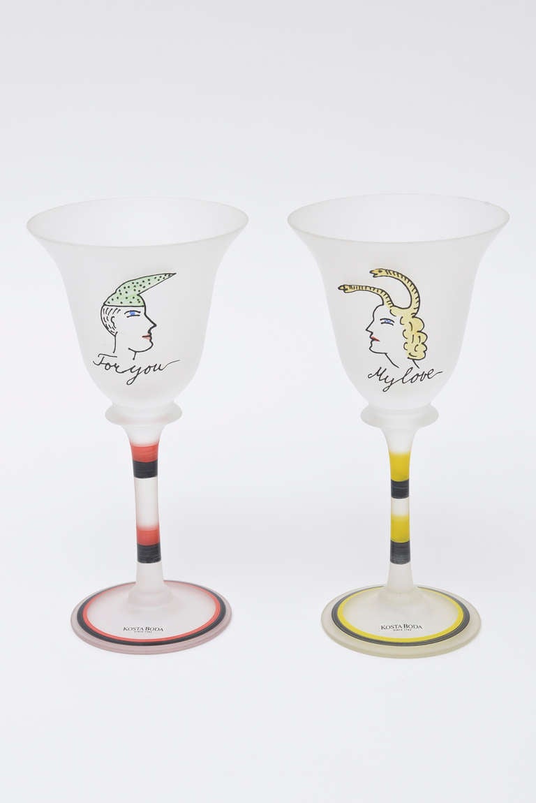 These romantic and lovely Cocteau inspired  wine goblets for two
make a lovely union.
These are from the 70's and have the original Kosta Boda sticker on the base of the front of the glass.
They say 