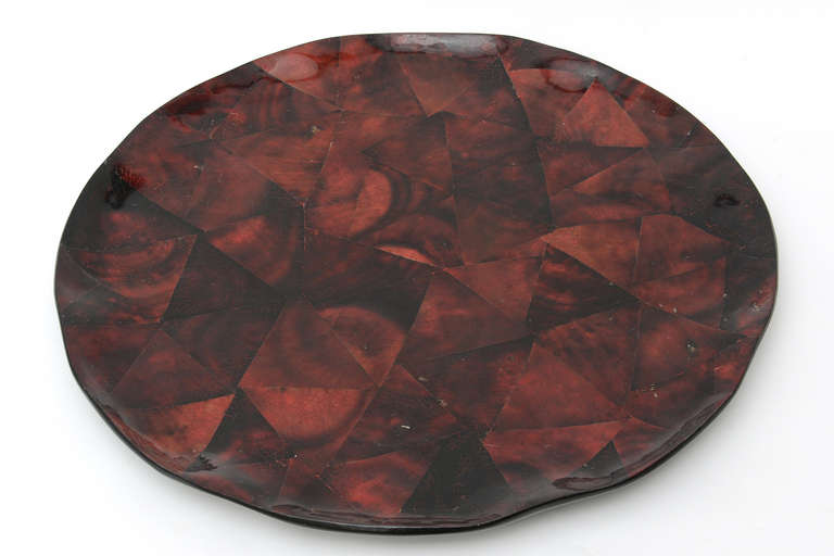 This monumental flat tray and or platter by Maitland Smith looks like a beautiful rose that has opened up in segments and in still form. Luscious shades or red to burgundy to wine to black. It is from the 1980s.