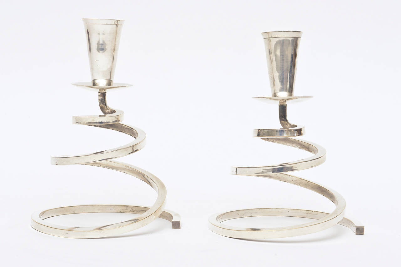 These fun whimsical spiral candlesticks look like a coil.
They are period and chrome-plated over brass. They have been polished.
Please note: These have not been re-plated. They were made by Fisher Manufacturing.